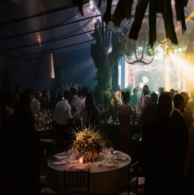 Business milestone dinner with company history tribute and executive anniversary reception