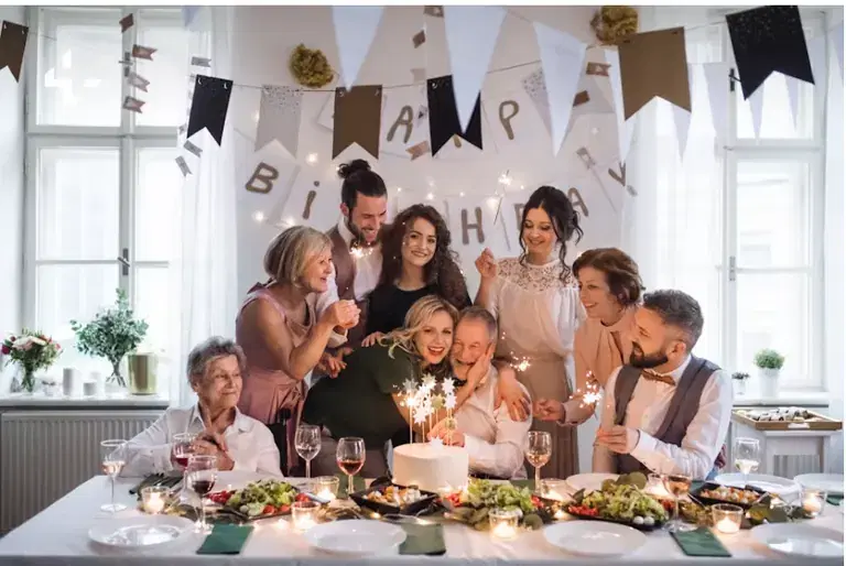Milestone birthday event with styled tables, entertainment, and a coordinated guest experience
