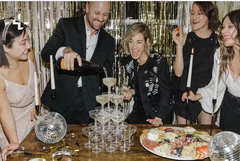 Private holiday party with seasonal decor, catering, entertainment, and guest seating