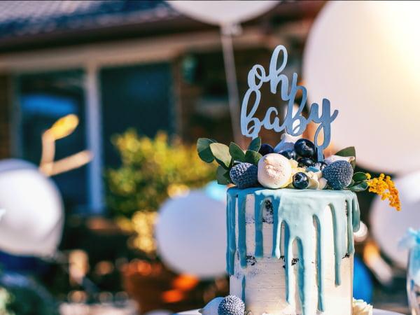 Baby shower planned with welcoming decor, seating, catering, and guest activities