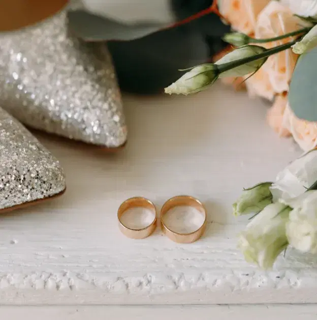 Wedding day planner coordinating ceremony timeline and vendor communication during event setup