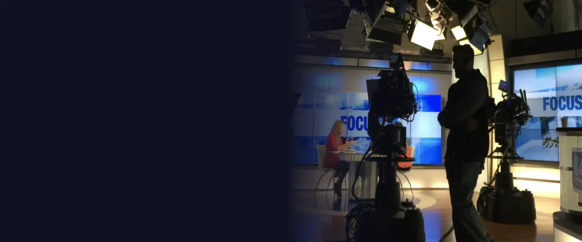 Corporate press conference with media cameras, podium staging, and journalist coverage