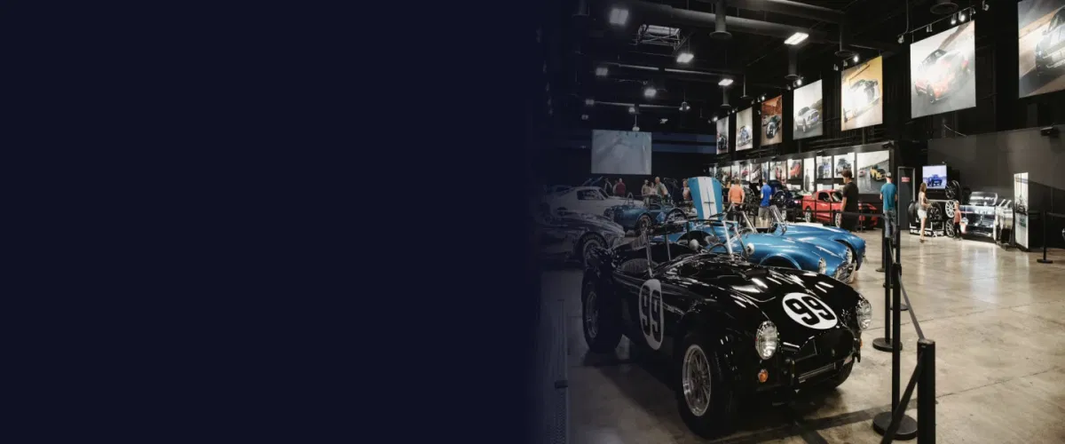 Trade show exhibition floor with sponsor activations, exhibitor booths, and product interaction areas
